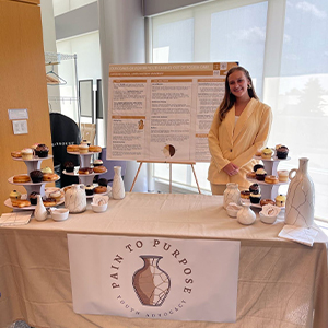 Caroline Stoaks at Pain to Purpose booth in Gilliam Center