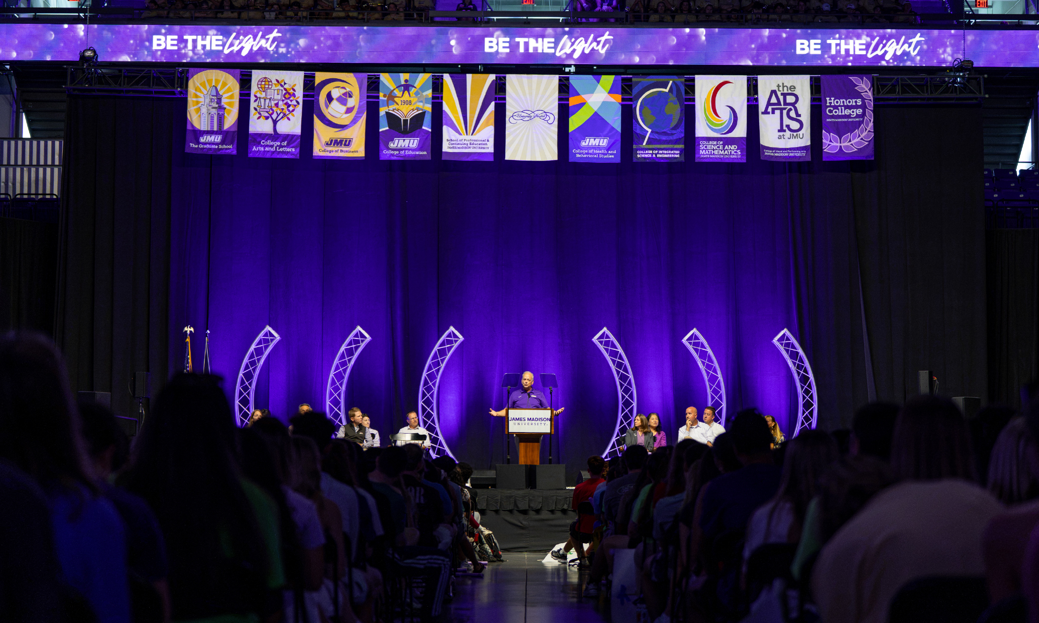President Jim Schmidt speaks at the Lights of Madison event in the Atlantic Union Bank Center.