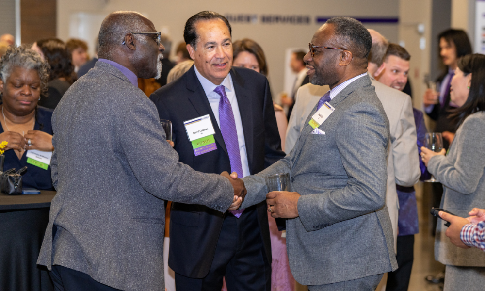 Alumni socializing at the awards event