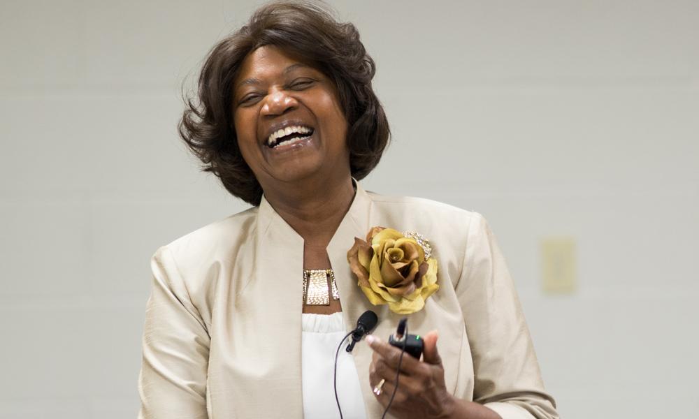 Sheary Darcus Johnson laughs at a JMU conference.