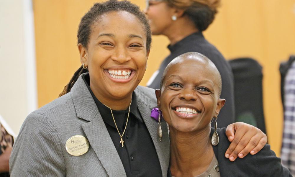 Close-up image of two Black women who are members of Sisters in Session