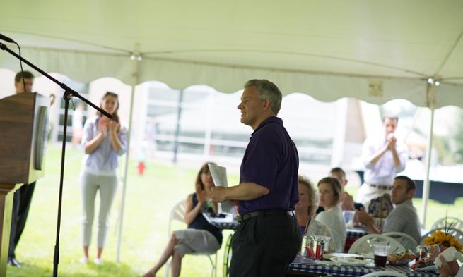 President Alger gets ready to address freshmen, alumni and parents at legacy picnic