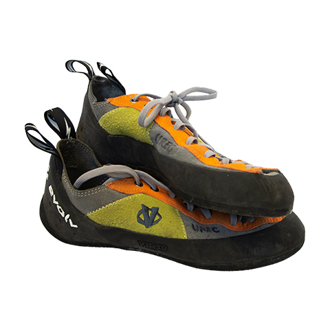 orange, black, and green climbing shoes
