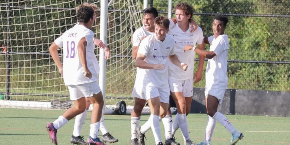 soccer players cheering