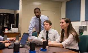 Jonathan Smith (left), Brandon Lancaster and Brittany Harwell discuss the data.