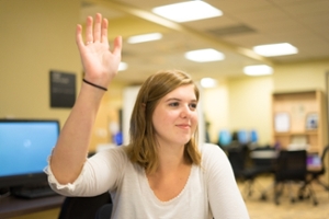 Picture of the student raising their hand to notify the tutors of their need for assistance