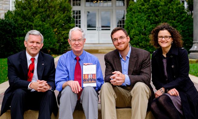 Photo of President Alger, and professors Tim Walton, Mark Piper and Pia Antolic-Piper