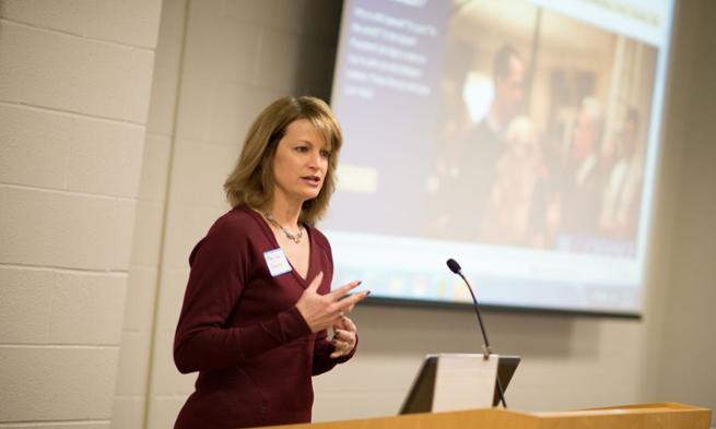 Mary Lou Bourne, director of technology transfer at JMU speaking at a Madison Business Network event