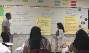 Photo of IdLS and middle-school students participating in science discussion