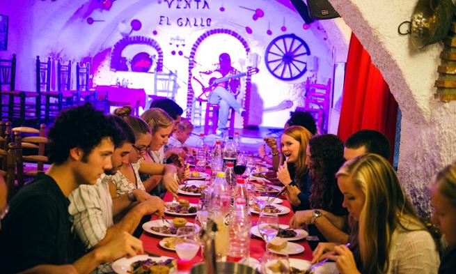 Students in Spain take in dinner and a Flemenco show after a day of classes.