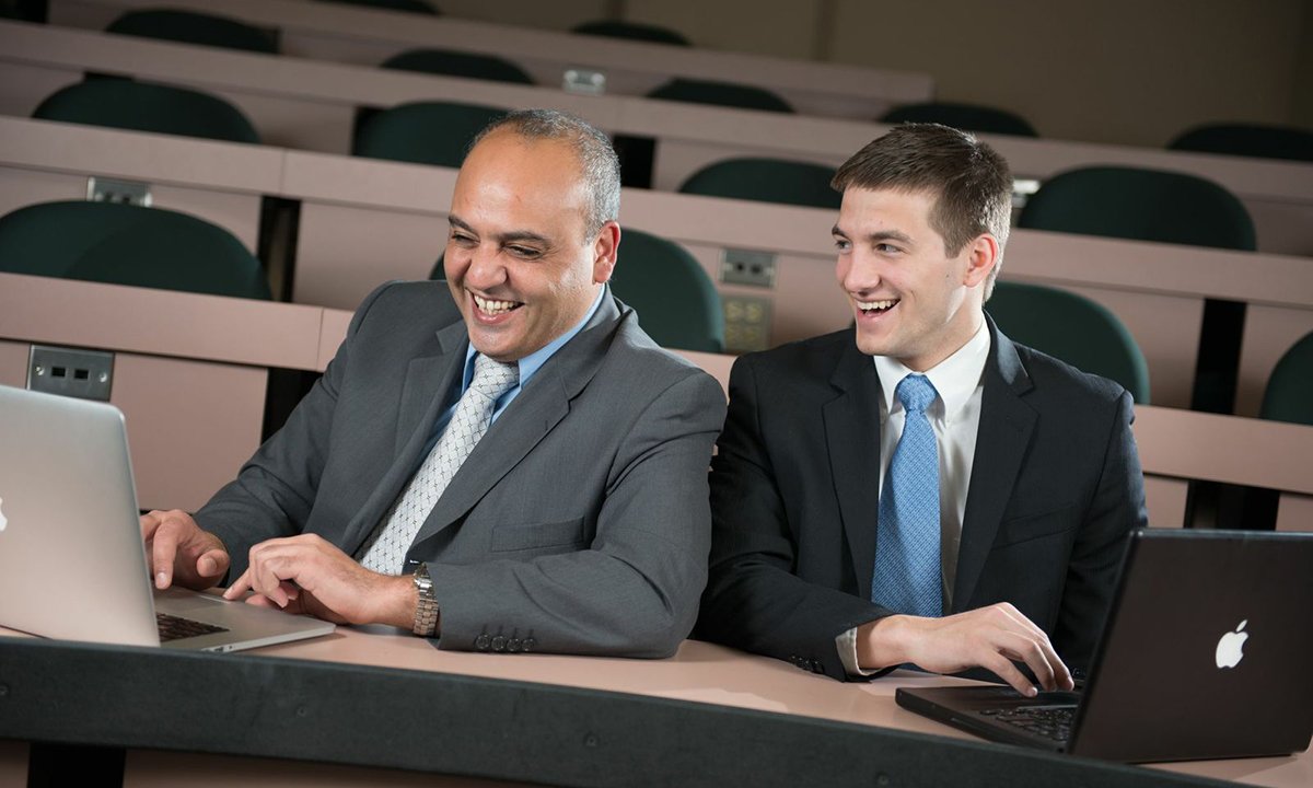 Madison Investment Fund adviser Elias Semaan and J.P. Kril ('13)