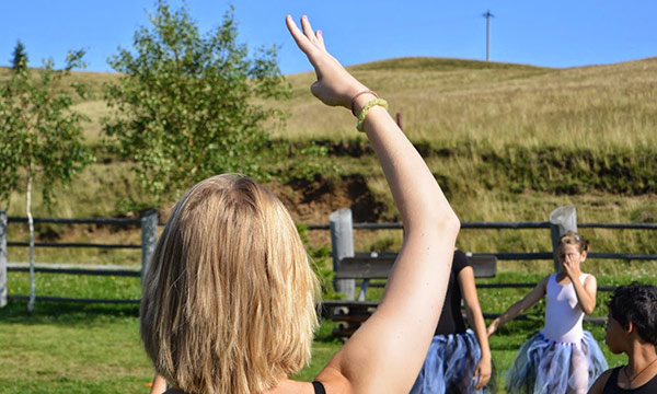 Photo of Caitlin McAvoy teaching dance