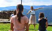 Photo of Caitlin McAvoy teaching dance