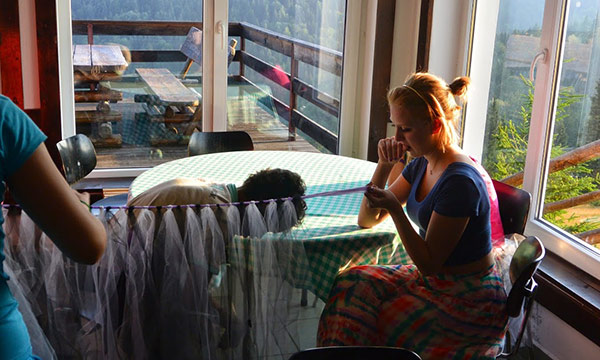 Photo of Caitlin McAvoy creating tutus for young dance performers