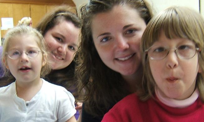 JMU students working with Precious Time respite care pose with kids