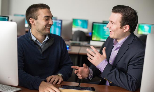 JMU students John Riley and Mark Thress, creators of ipad music therapy program