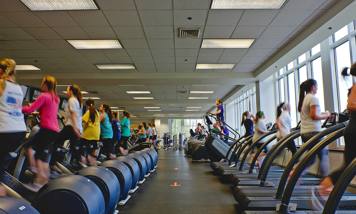 Photo of JMU students working out at UREC