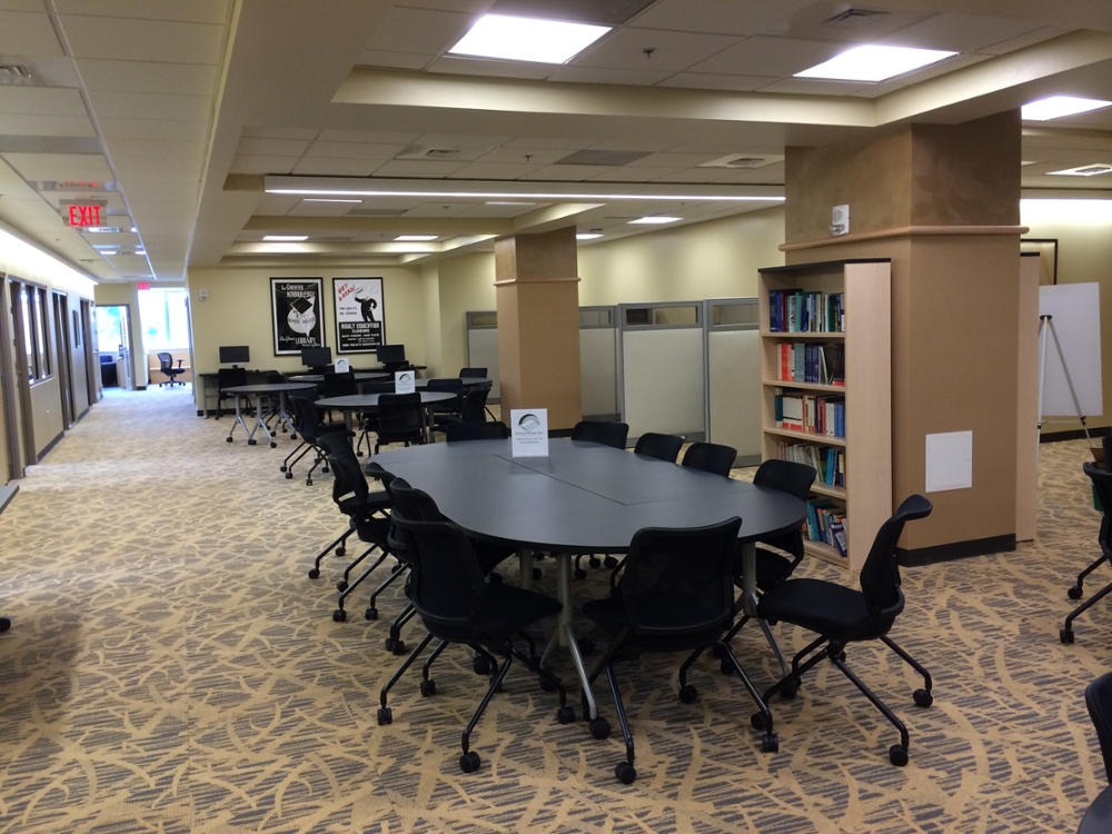 round tables and chairs in the University Writing Center