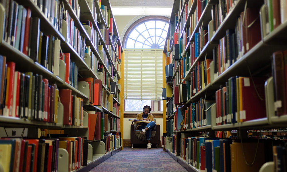 student studying in Carrier library