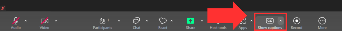 The control bar in a Zoom meeting. An arrow points to the Show captions button.