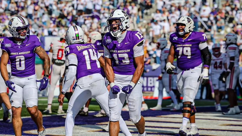 JMU Football players celebrate victory