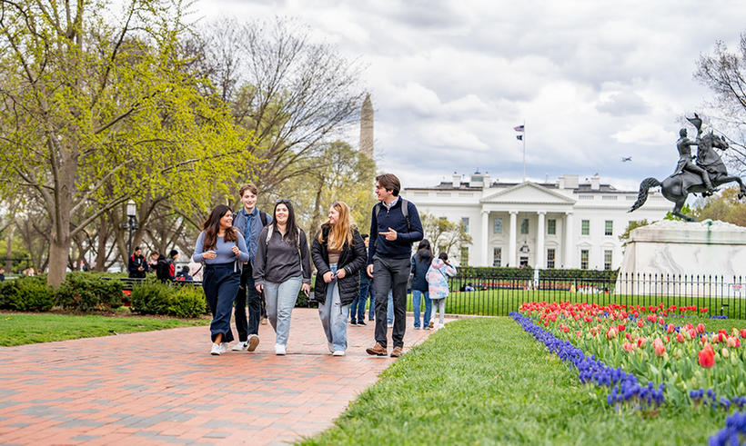 Students walking in D.C. in front of the White House