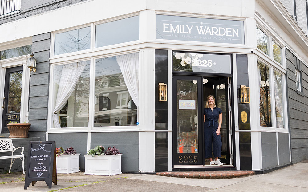 Emily Warden in the doorway of her storefront