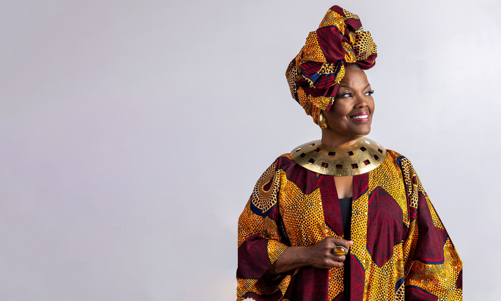 a woman looking to the side and smiling