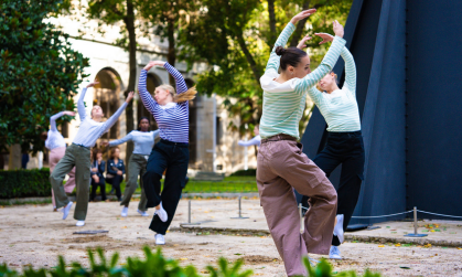 students performing abroad in a dance practice
