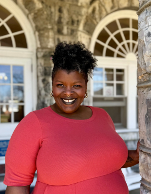 photo of school of music student posing outside on JMU's campus