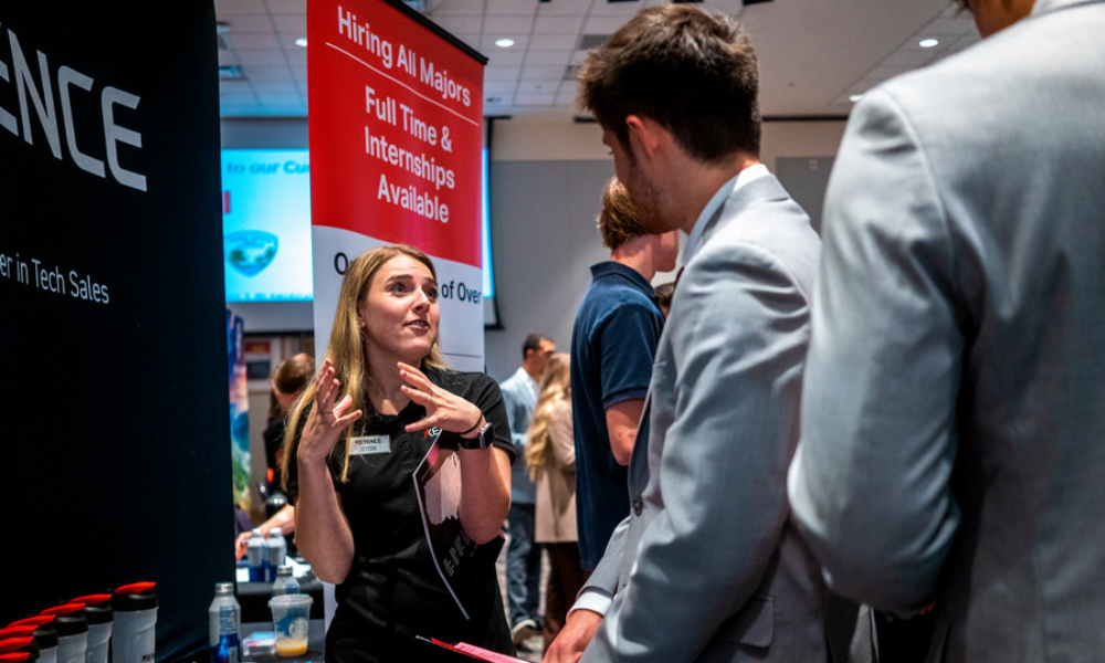 student and employer talking