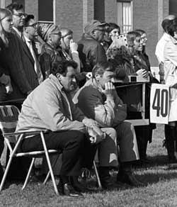 At Madison College's first football game, President Ronald E. Carrier (left) and Vice President Ray V. Sonner sat in folding chairs and watched from the sidelines. 