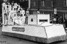 Glee Club members on float in Apple Blossom parade