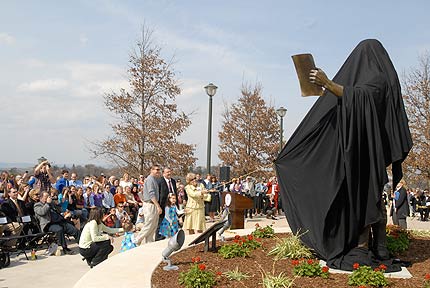 The statue is unveiled.