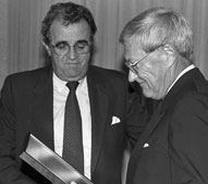 Dr. Ray Sonner (right), originator of the Duke Dog, with President Ronald E. Carrier at the dedication of Sonner Hall in 1990.