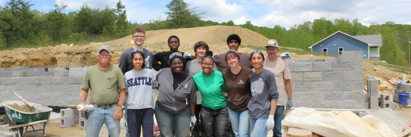 participants at frontier housing site