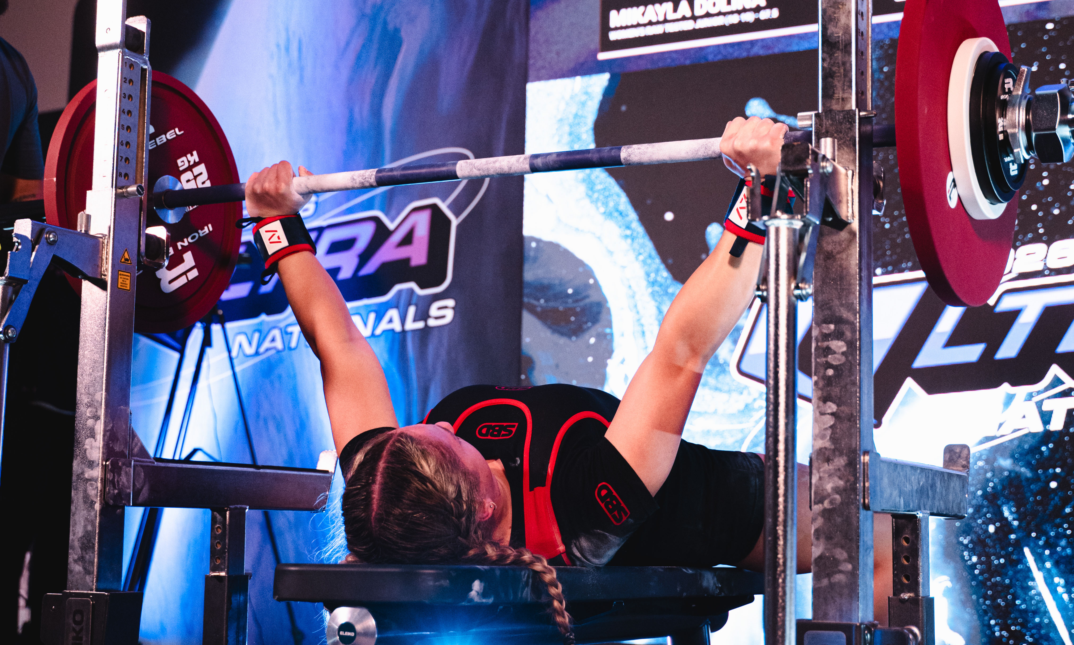 Photo of Mikayla Dolina lifting.