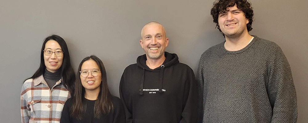 Faculty and students receive the 2025 Woollatt Distinguished Paper Award from NERA