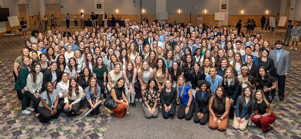 Group photo of JMU students at the May 2025 Research Poster Symposium.