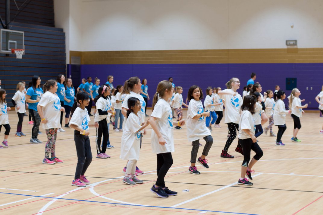 girls participating in group exercise on movin' and groovin' day