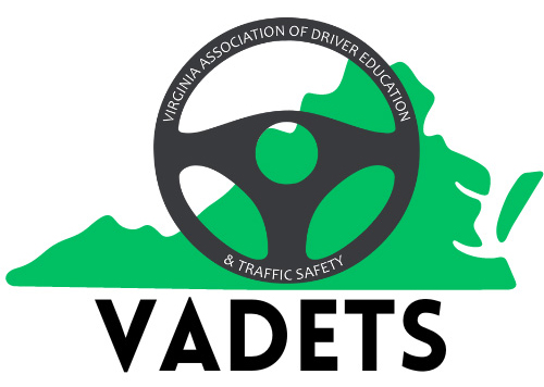 Virginia Association of Driver Education & Traffic Safety Logo showing an image of the Commonwealth of Virginia in green with a steering wheel in black with the association name around the circle.