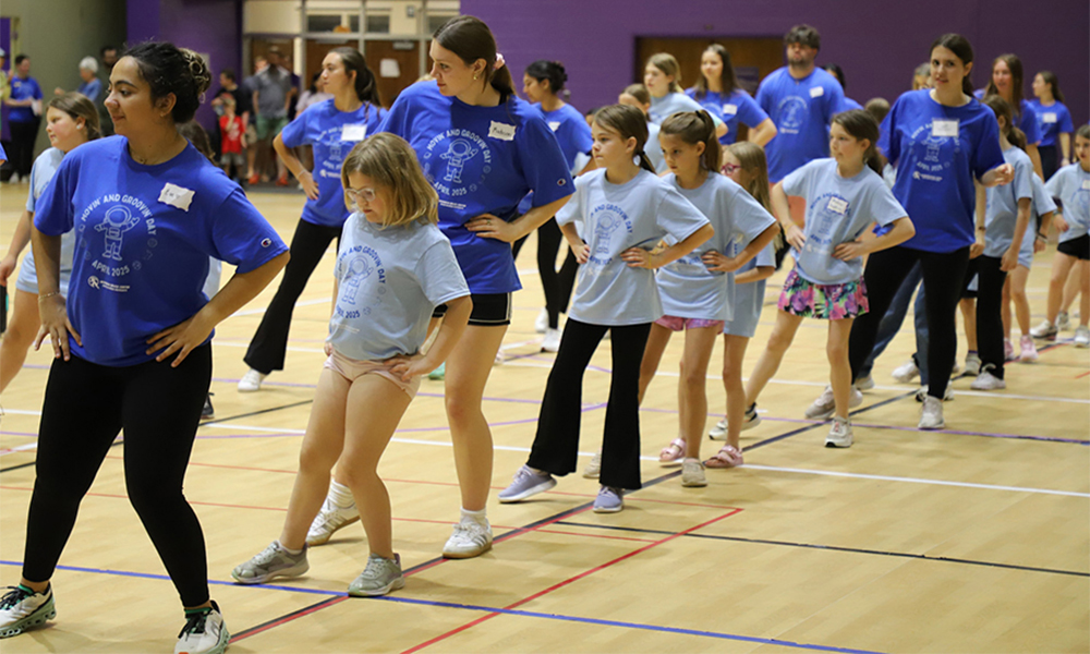 Girls and Staff line dancing