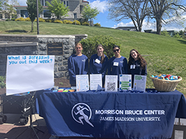 JMU Students staff a table about managing stress