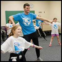 Movin' and Groovin' Day - children and an adult participating by dancing