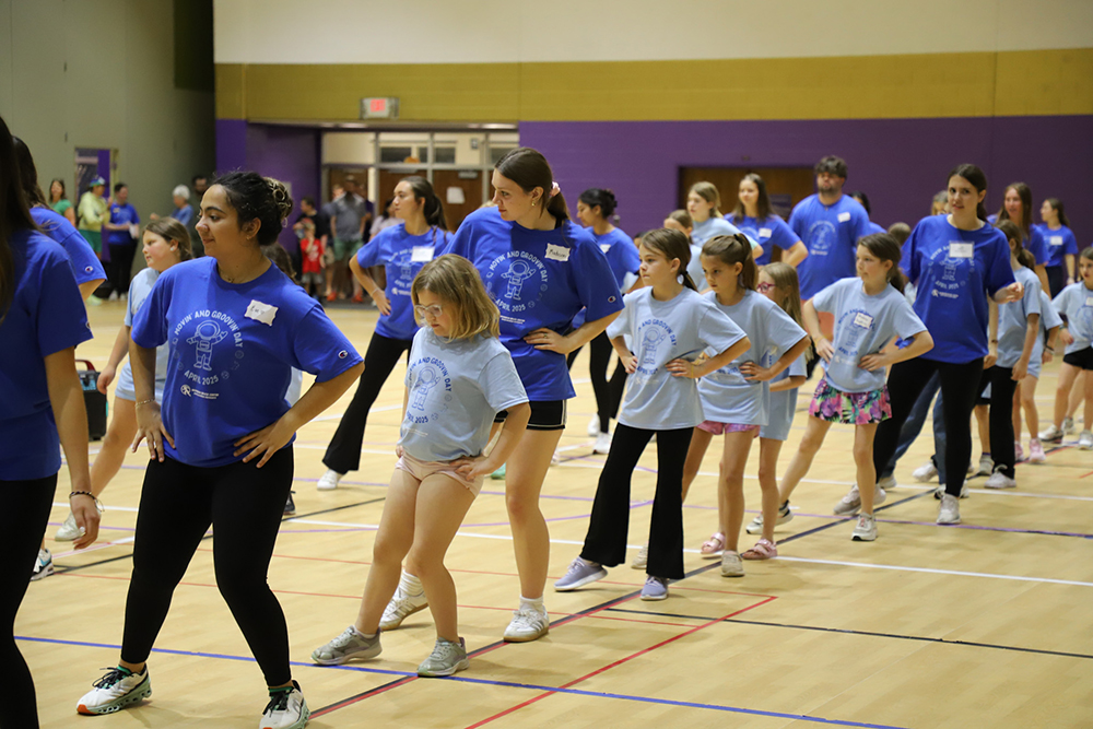 Girls and Staff line dancing