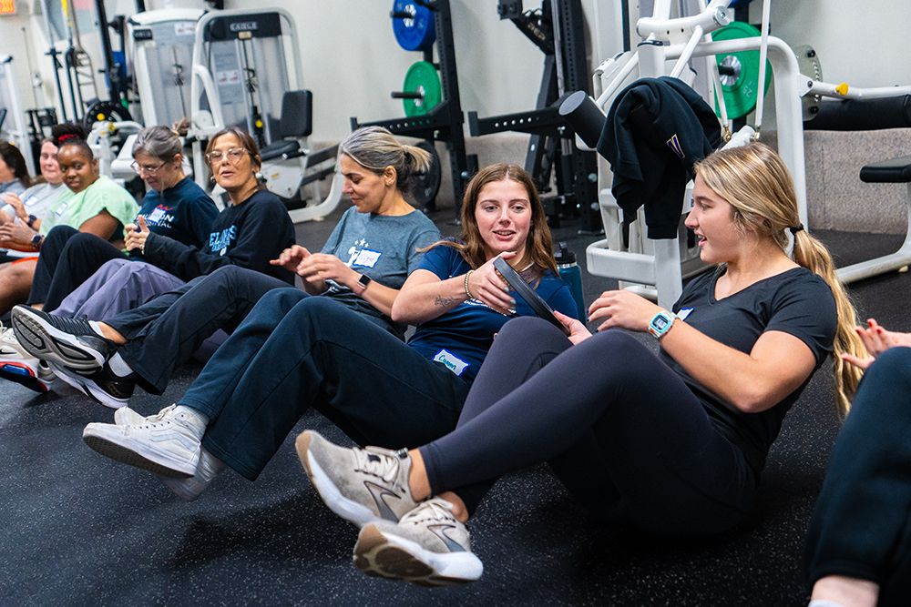 Women exercising in a line