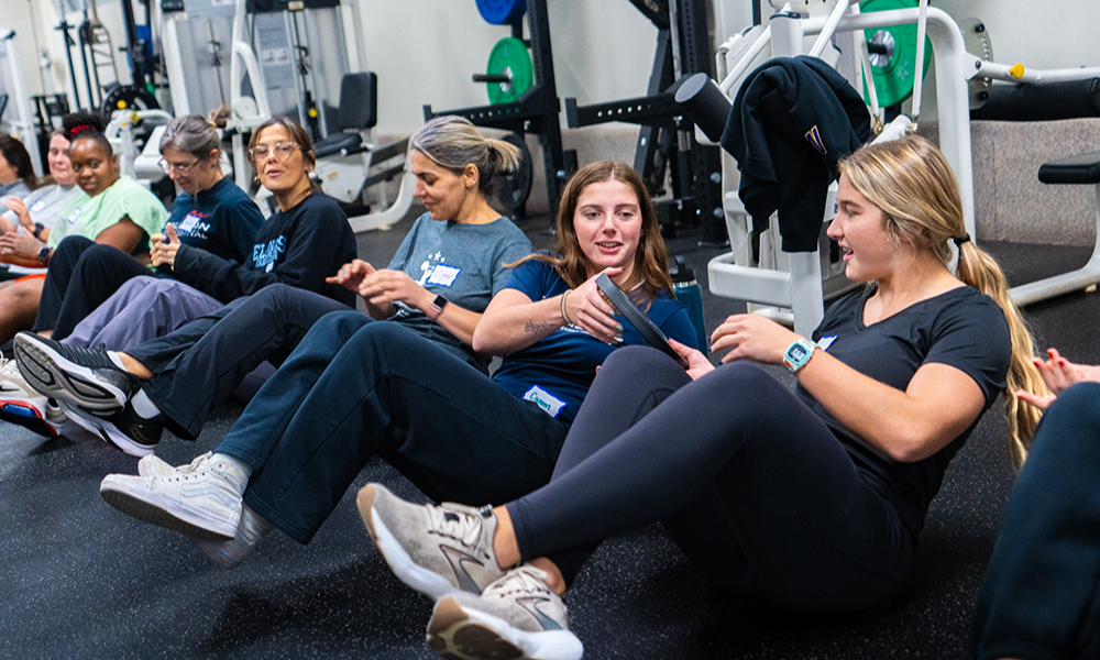 Women exercising in a line