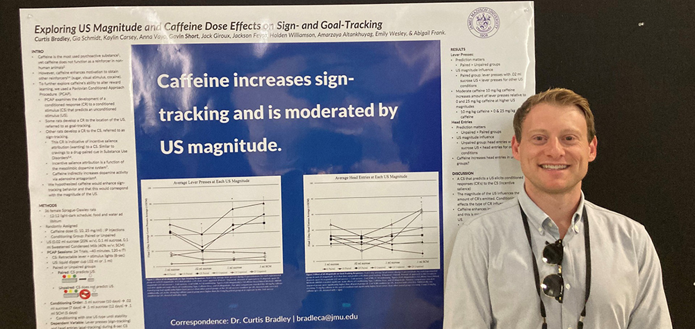Award winner Professor Curtis Bradley with poster