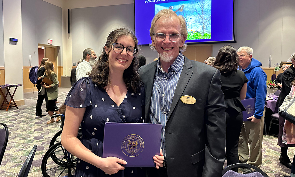 BSW student with Dr. Simon Funge receiving the Samuel Page Duke Award at the Academic Affairs Awards and Recognition Luncheon