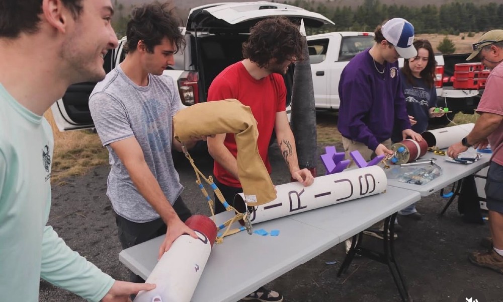 Engineering students preparing rocket for NASA Student Launch.